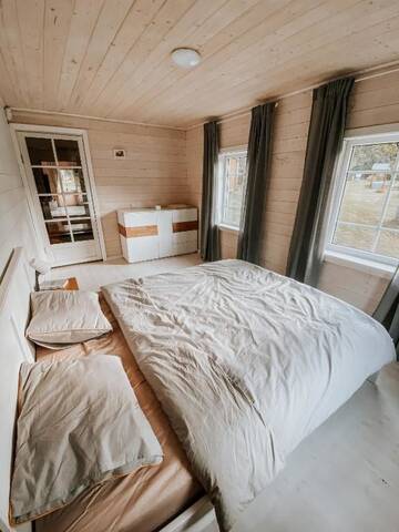 Фото номера Дом с 2 спальнями Дома для отпуска Barbaripolis cottage in the forest г. Dumšiai 51
