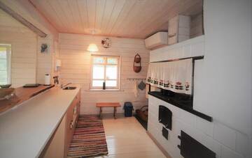 Фото номера Дом с 2 спальнями Дома для отпуска Barbaripolis cottage in the forest г. Dumšiai 60