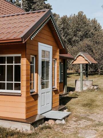 Фото номера Дом с 2 спальнями Дома для отпуска Barbaripolis cottage in the forest г. Dumšiai 37